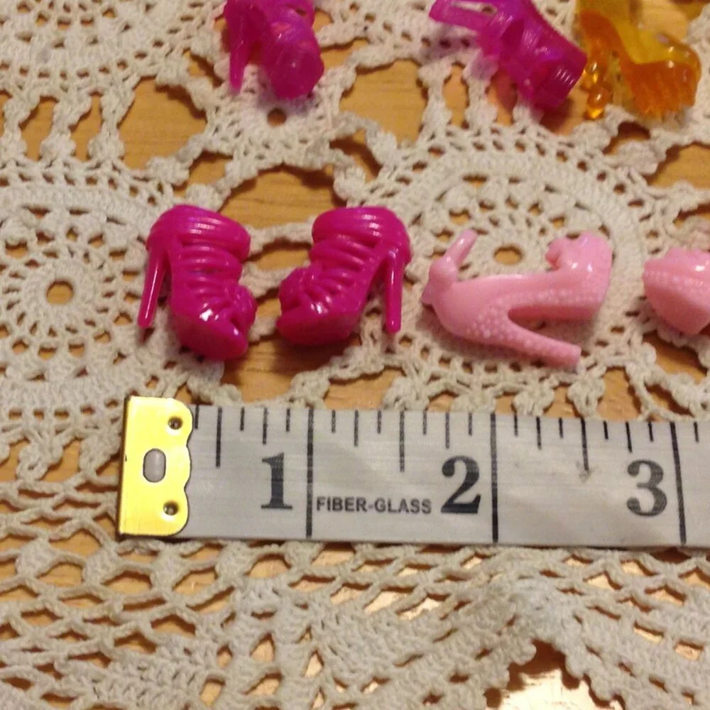 Bundle of 10 doll shoe pairs for Barbie or similar dolls